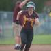 Dexter's Natasha Drinkard runs to home plate to score Dexter's first run of the game against Pioneer. 
Courtney Sacco I AnnArbor.com 
